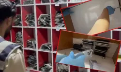 Diyarbakır’da iş yerindeki gizli bölmeden 65 kaçak cep telefonu çıktı