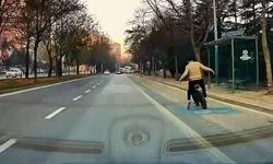 Eli cebinde bisikletle gidiyordu: Ölümden son anda döndü