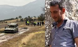 Yanmış aracın yanında başsız ceset bulundu