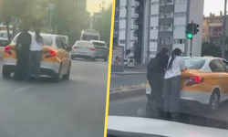 Diyarbakır'da korkutan görüntü: Patenli gençler taksinin arkasına tutundu