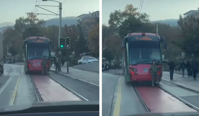 Tehlikeli yolculuk: Tramvayın arkasına tutunarak ilerledi