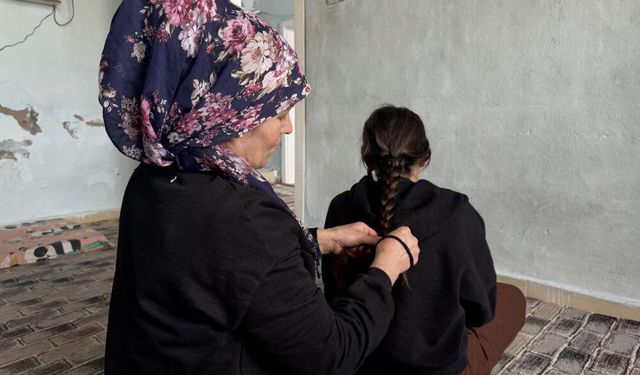 Şiddet ve kuma arasında 4 çocuğunu büyütüyor