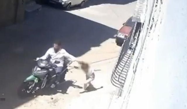 Kızını darbedip motosikletle sürükledi