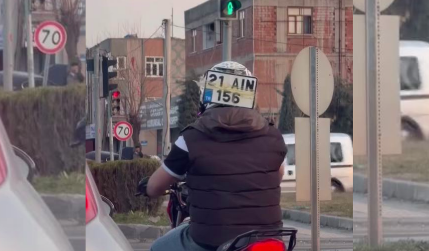 Diyarbakır’da şaşırtan görüntü: Plakayı kaskına bantladı!